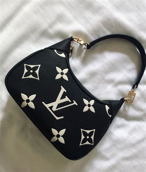 black vinyl louis vuitton bag|louis vuitton bag black original.